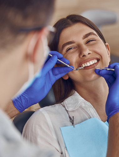 Patient in a regular check-up with a dentist