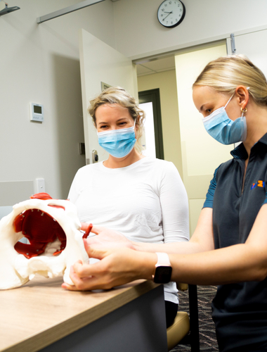 Women's Health Physiotherapist in a Consultation