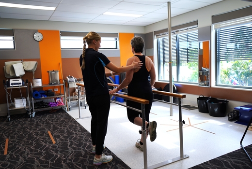 woman balancing test with exercise physiologist