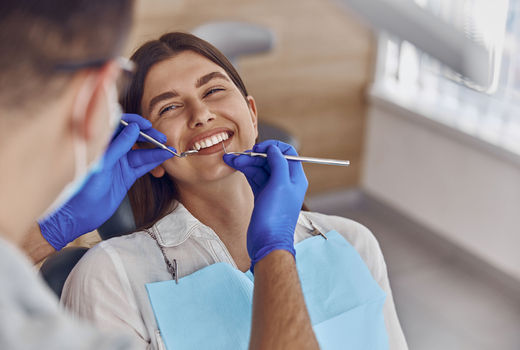 Patient in a regular check-up with a dentist