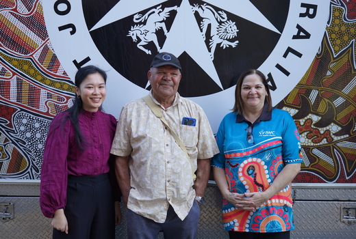 IWC employee with patient and Eye Van Employee