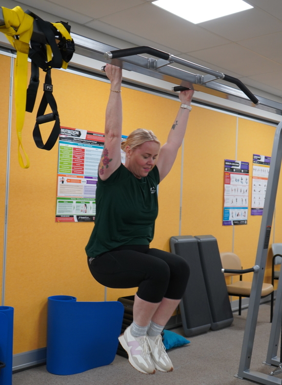 person doing a chin up