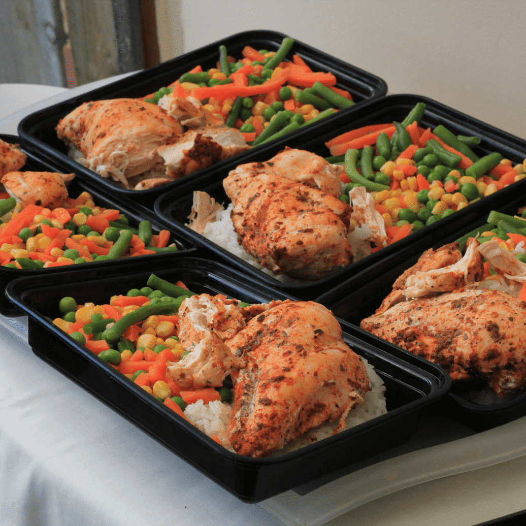 Pre-prepared meals of chicken and vegetables in plastic containers