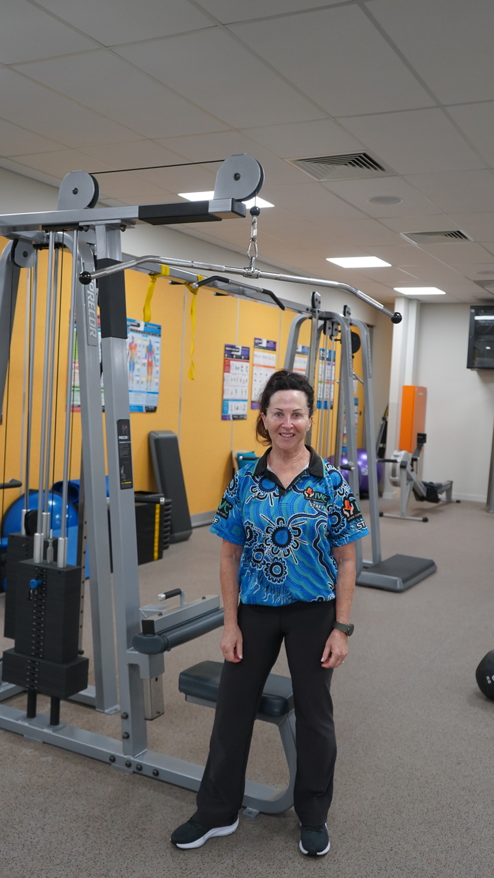 Gay standing in the gym