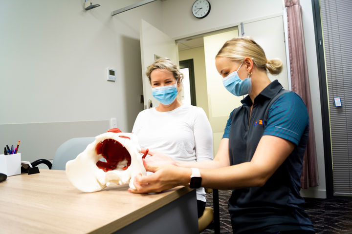 Female physiotherapist in a women's health physiotherapy consultation