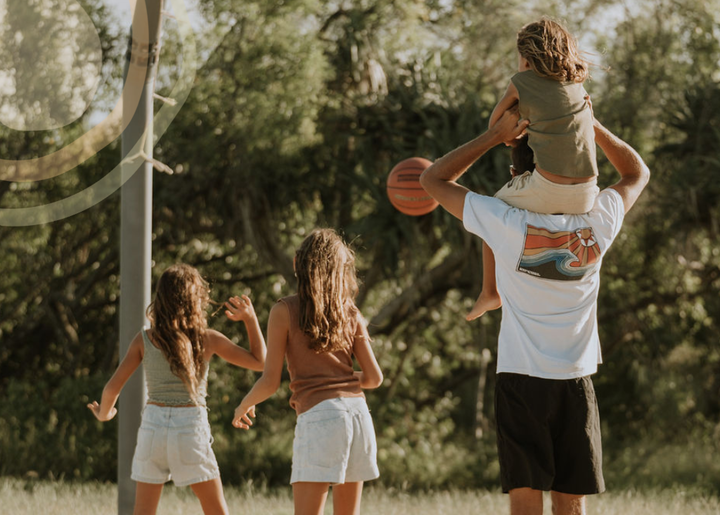 family plays basketball
