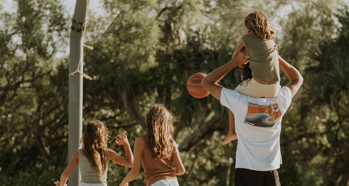family plays basketball