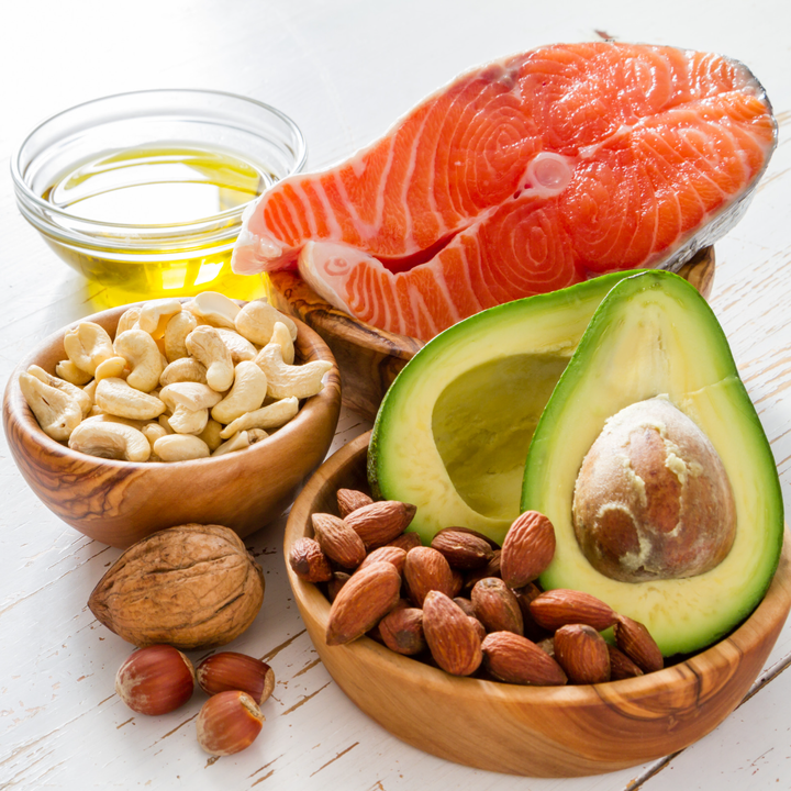 selection of healthy fat foods including salmon and avocado