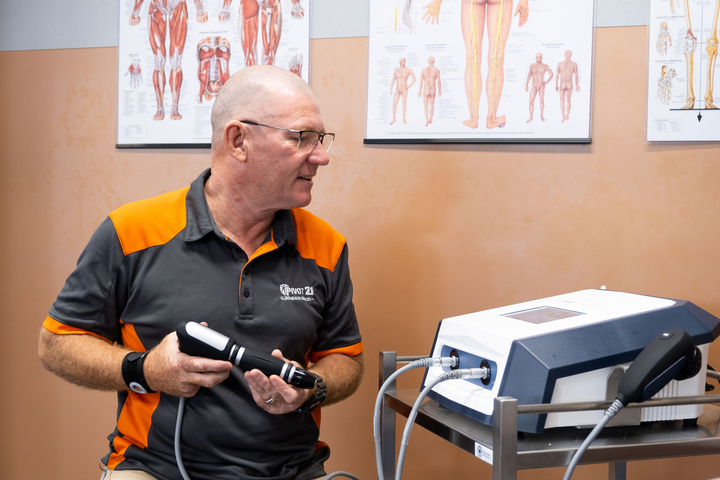 Physiotherapist in front of tools