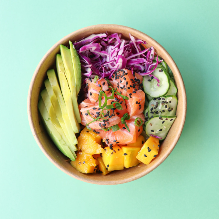 balanced bowl meal with vegetables and fish