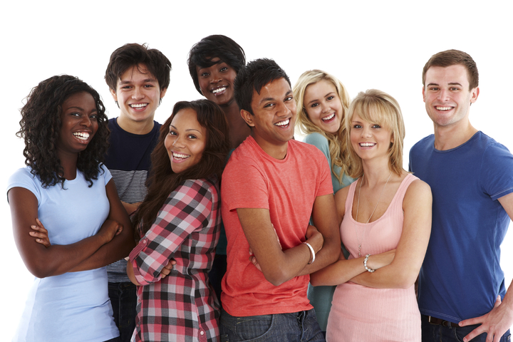 Diverse group of people pose for the camera