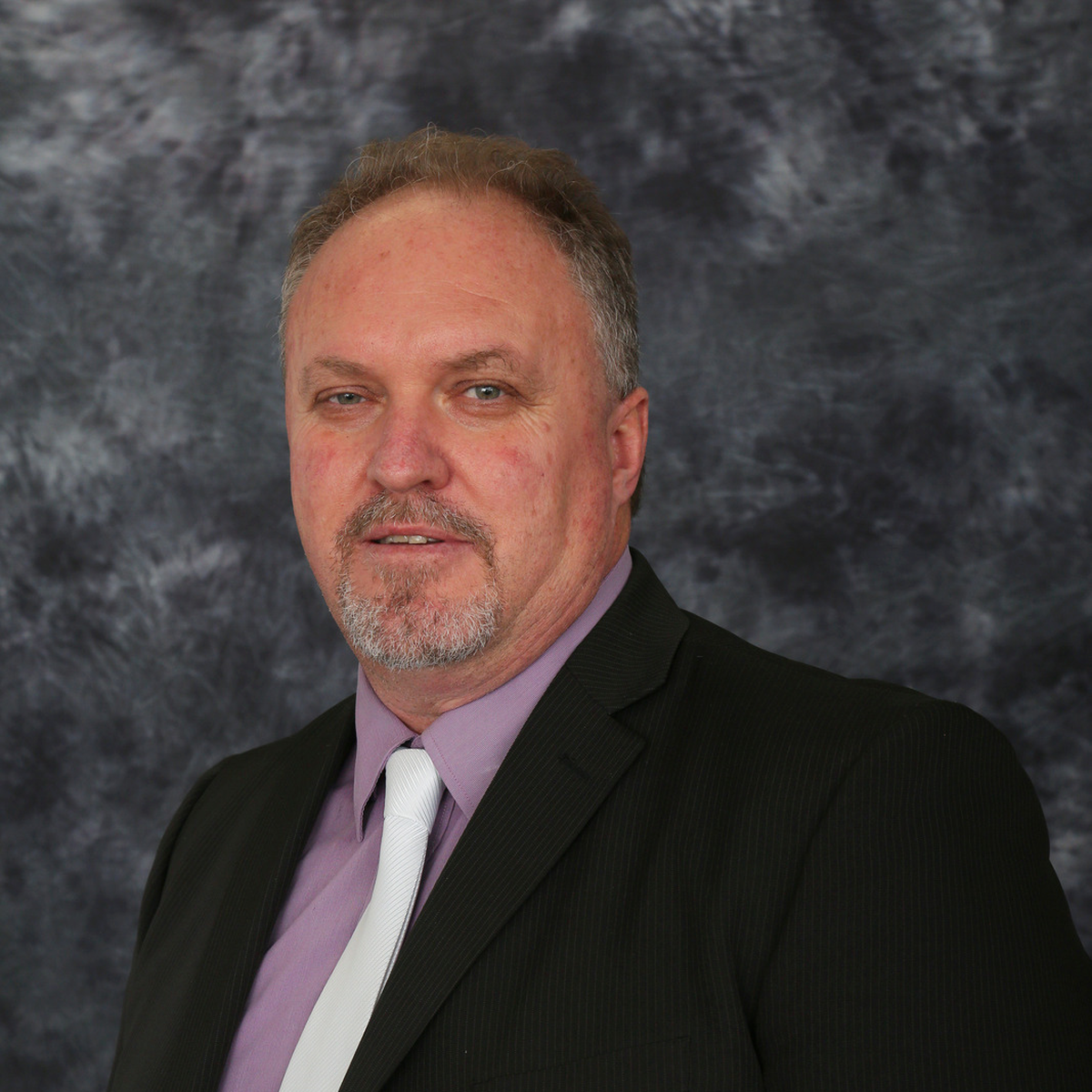 Headshot of IWC CEO, Wayne Mulvany