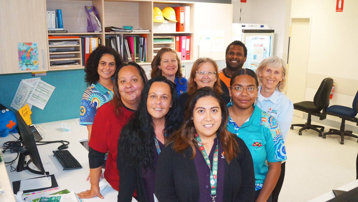 IWC Clinical team stands in nurses station