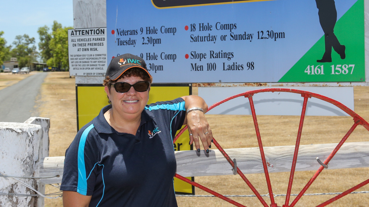 Cynthia George Stands at Entrance to Gayndah Golf Club