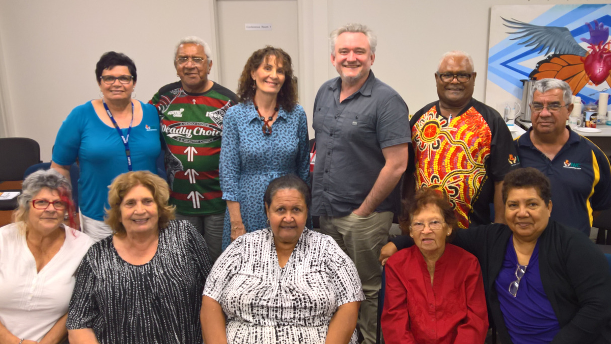 Focus Group looks at camera smiling
