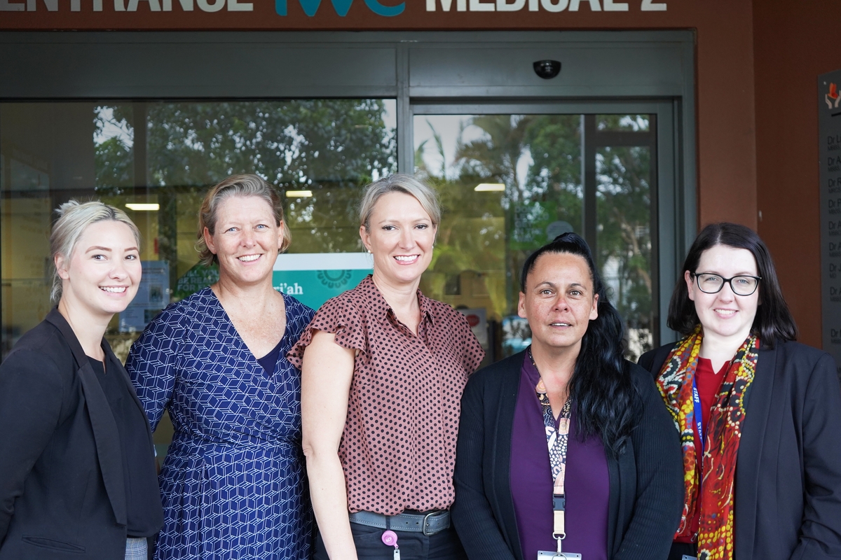 IWC UCC Team in front of building